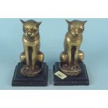 A pair of brass Egyptian cat bookends