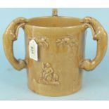 A 19th Century treacle glaze large tyg/frog mug, three greyhound handles and three internal frogs,