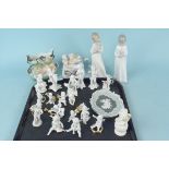 Two Nao figurines plus a selection of 'In the White' cherubs etc