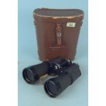 A cased pair of Hilkinson 20x60 field 3" binoculars