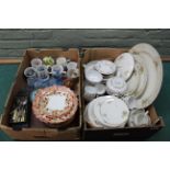 Two boxes of mixed ceramics including a part tea set, blue glass dressing table set,