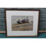 A framed watercolour of beached fishing boats, signed 'W Eliott Lockhart',