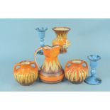 Four pieces of Art Deco pottery hand painted by 'Wadeheath' and 'Roskyl' plus a pair of blue and