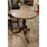 A late Regency mahogany tripod table with reeded top