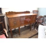 An Edwardian Adam style mahogany sideboard with double cross stretchers