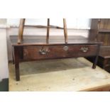 A late 18th Century oak single drawer side table,