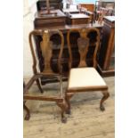 A pair of Queen Anne style walnut side chairs (one seat missing)