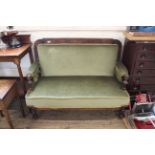 A late Victorian walnut framed two seater settee