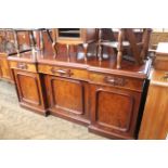 A mid Victorian mahogany sideboard, applied detail to drawer and three cupboards below, approx.