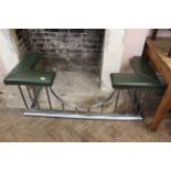 A Victorian style steel club fender with green leather seats approx.