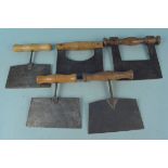 Five assorted vintage steel and wooden handled pastry cutters