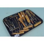 Assorted chisels, gauges, corkscrews, stilton cheese scoop,