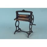 A Victorian 'The Gem' toy mangle complete with handle and wooden rollers