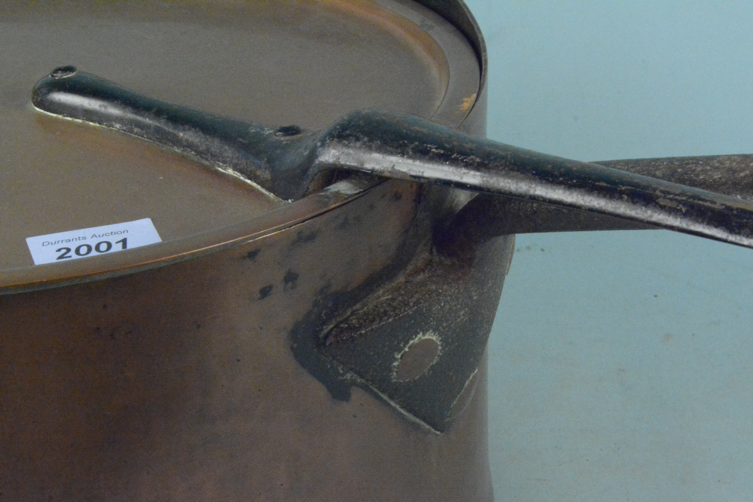 A large heavy 19th Century seamed copper saucepan having copper and iron handles with a lid having - Image 2 of 3