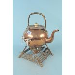 A late Victorian copper spirit kettle on a stand designed as a rustic fence