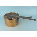 A 19th Century seamed copper saucepan engraved F.H.M. with a lid, both having iron handle, 28.
