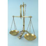 A set of late 19th Century brass pulley shop scales on tripod base