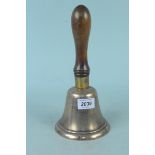 A 19th Century brass school hand bell with turned wooden handle