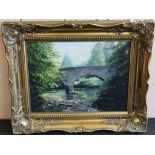 A gilt framed oil on board 'Bridge over River Nairu ad Croy' by indistinct name 1989,