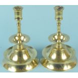 A fine and rare pair of 17th Century brass candlesticks,