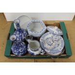 A box of blue and white china including a pair of vases, dinner wares,