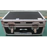 A hard case containing various audio recording equipment including pop shields,