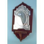 A Venetian style mounted mirror,