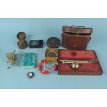 A small box of mixed items to include a 'Newlight' combined cigarette case, lighter and compact,