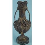 An Art Nouveau period bronze vase with female figure mounted on stone base,