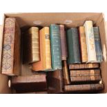 A box of mixed antique volumes including The Works of Monsieur de la Bruyere,