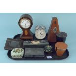 A mixed lot containing a metronome, a waisted mantel clock, a cloisonne lidded pot,