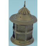 An Arts and Crafts circular brass and glass lantern with rising canopy,