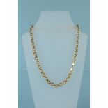 An 18ct gold necklace consisting of interlocking circular links, some with textured detailing,