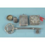 Mixed silver and white metal including a vesta, presentation key,