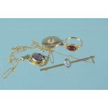 Mixed 9ct gold and yellow metal jewellery including a 9ct gold locket, a 9ct gold amber set ring,
