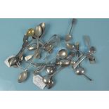 A large quantity of silver cutlery, mostly cruet spoons,