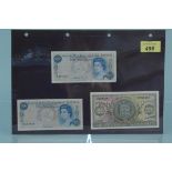 A States of Guernsey £1 banknote and two Isle of Man fifty pence banknotes