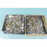 A large bulk lot of mixed world coins in two tubs