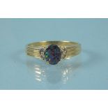 An 18ct gold opal and diamond set ring, size M, weight approx 2.