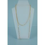 An unusual 9ct gold necklace with tassel design,