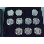 Ten and silver proof £5 coins from various Channel Islands,