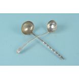 Two silver sauce ladles, one Victorian Scottish with twisted handle,