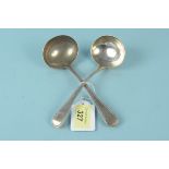 A pair of Georgian silver sauce ladles, hallmarked London 1808, maker William Eley,