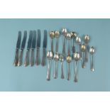 Mixed silver cutlery consisting of various teaspoons, a cruet spoon and six silver handled knives,