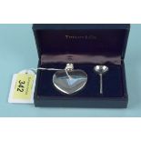 A silver Tiffany & Co heart shaped perfume bottle and funnel in original box