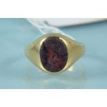 An 18ct gold stone set signet ring, size M,