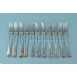 Eleven matching Victorian silver forks, each engraved with crest, hallmarked London 1854,