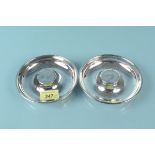 Two silver coin set dishes, one with Churchill crown, the other the commemorative crown,