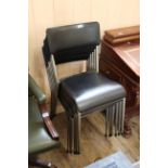A set of six vintage Italian black and chrome stacking chairs