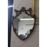 A late 19th Century French gilt shield wall mirror